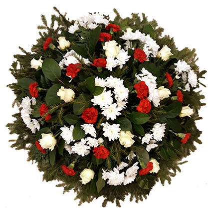 Flowers. Funeral wreath with white roses, red carnations, white chrysanthemums and decorative foliage.
Wreath with a ribbon