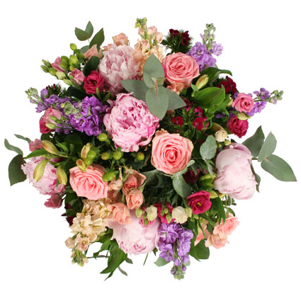 Flower delivery. Abundant flower bouquet of peonies, mattiolas, roses, lisianthus, alstroemerias and other seasonal flowers.