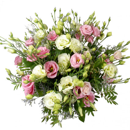 Flower delivery. Romantic bouquet of pink and white lisianthus with decorative foliage.