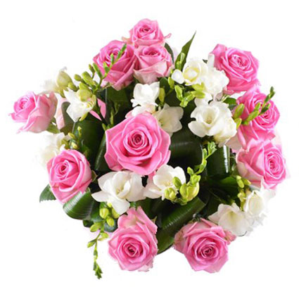Flowers delivery. Beautiful bouquet of 11 pink roses and white freesias.