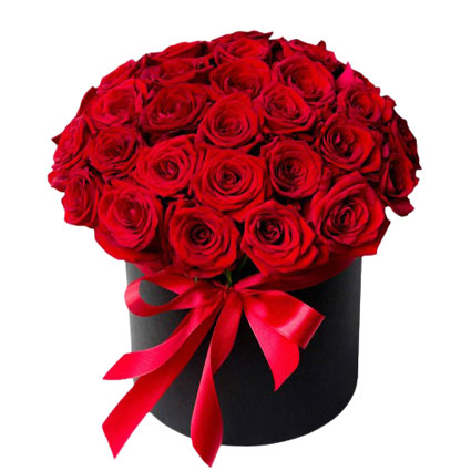 Flowers delivery. Arrangement of 35 red roses in a flower box - the essence of elegance, romance and passion.
