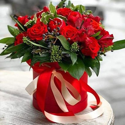 Flower box with red roses