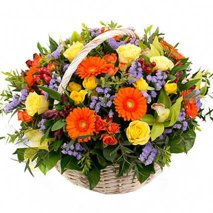 Flower delivery. Colorful floral arrangemet of yellow and orange spray roses, yellow roses, green cimbidium orchids, orange