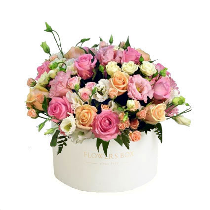 Flower delivery Latvia. Arrangement of pink and creamy roses, white spray roses, white and pink lisianthus in a flower box.