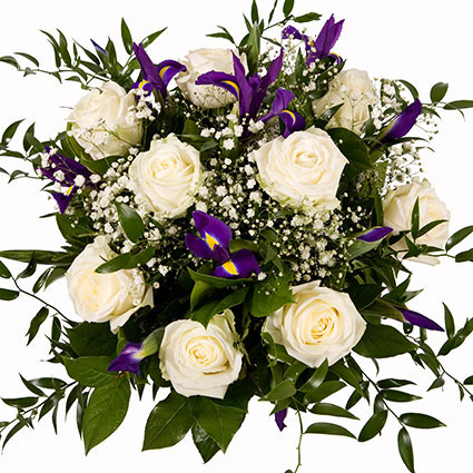 Flowers in Riga. White roses and blue irises  in a beautiful floral bouquet.
