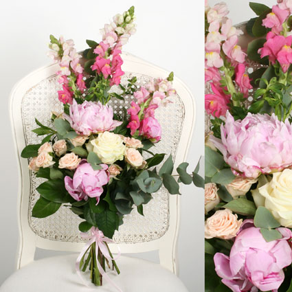 Flowers on-line. Seasonal flower bouquet is made of roses, peonies and dragon flowers.