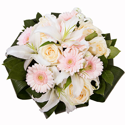 Flowers. Bunch of flowers in soft shades of white roses, white lilies, pink gerberas and decorative foliage.