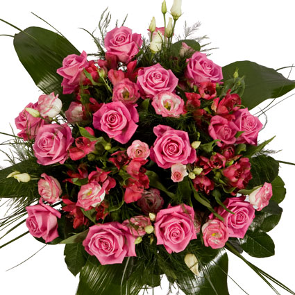 Flowers in Riga. Different shades of pink in bouquet of pink roses, pink llisianthus and reddish-pink alstroemerias.